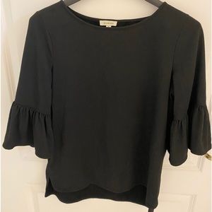 Women’s size medium shirt.